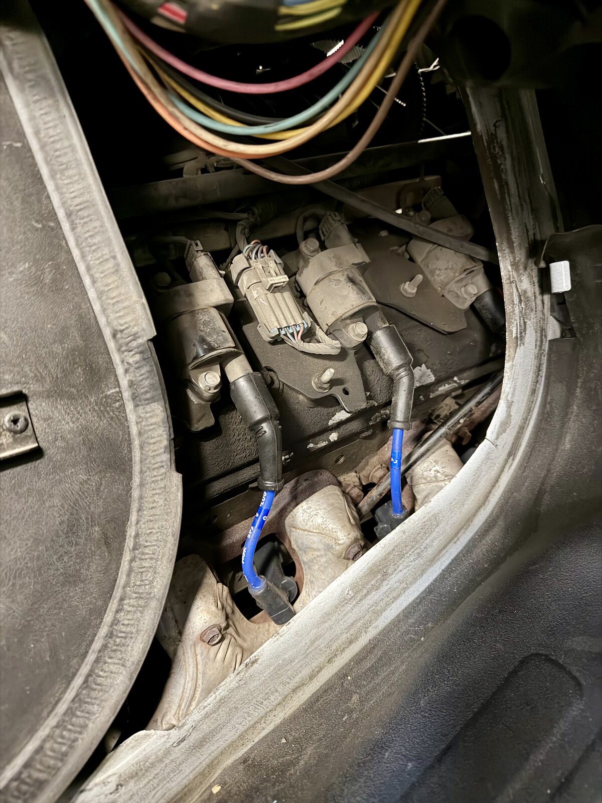 New spark plug wires installed in Chevy Express van engine bay